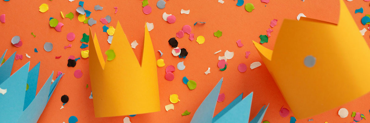 paper confetti and crowns